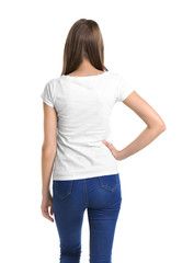 Obraz premium Young woman in t-shirt on white background. Mockup for design