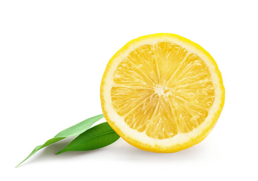 Half of lemon with leaves on white background