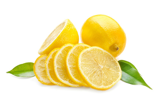 Fresh ripe lemons with leaves on white background