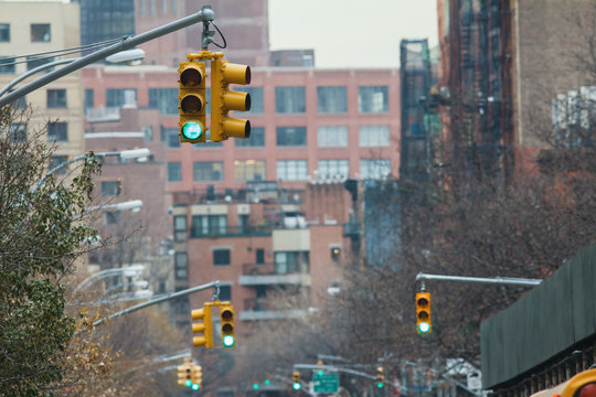 A lot of traffic lights on street of new york