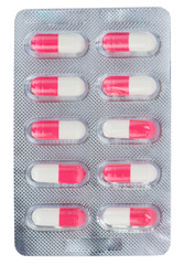 Pink and white capsule in blister pack