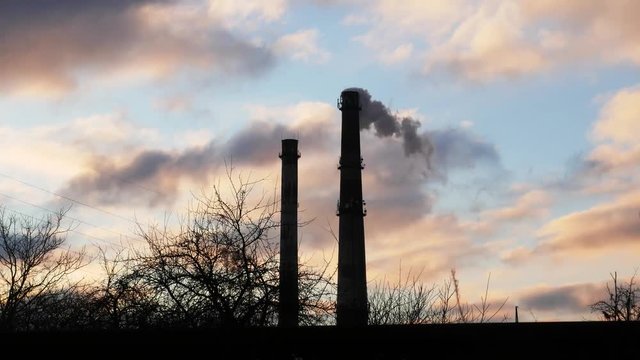 Industrial tube chimney smoke timelapse