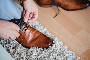 getting ready groom wedding shoes