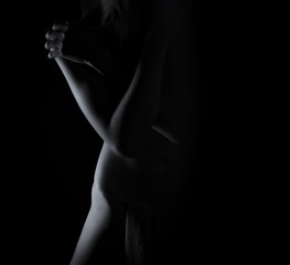 woman posing in black shadow