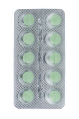 green medical tablet in blister pack on white