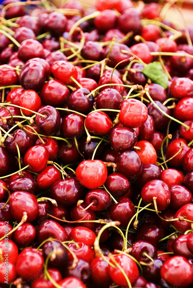 Wall mural group of red ripe cherries,