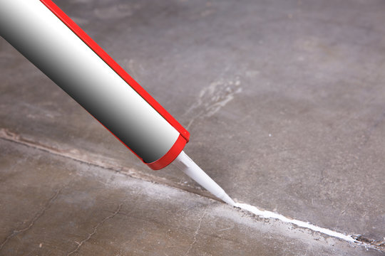  Sealant gun crack
covers the crack in the floor of the wall tile concrete