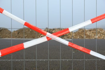 fence and caution tape