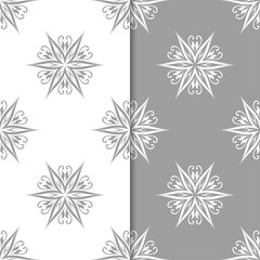 White and gray floral backgrounds. Set of seamless patterns