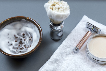 machine for shaving, shaving brush and soap