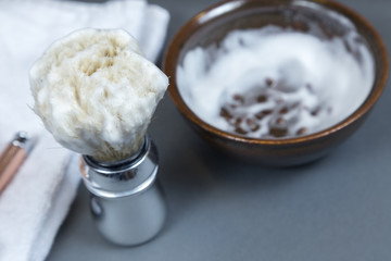 machine for shaving, shaving brush and soap