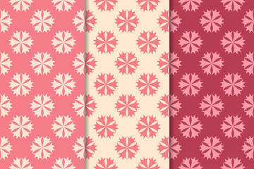 Set of red floral ornaments. Cherry pink vertical seamless patterns