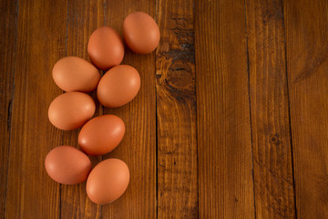 Fresh eggs on wooden table