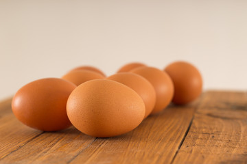 Fresh eggs on wooden table