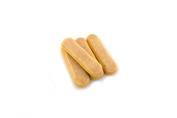 ein haufen löffelbiskuits auf einem hintergrund