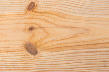 Rough cut wooden plank closeup background with copy space.