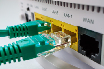 white router includes two green cable connectors rg45 - obrazy, fototapety, plakaty