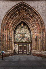 Fototapeta na wymiar Kirche Sankt Nikolai, Eingang Westportal Nikolaikirche Stralsund