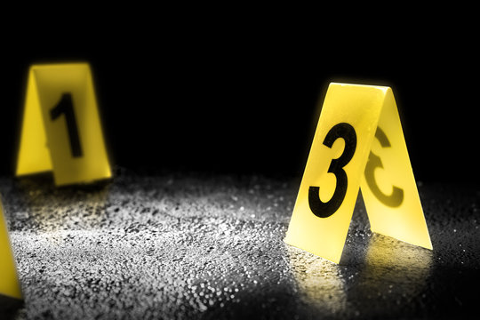 evidence markers on the floor, high contrast image