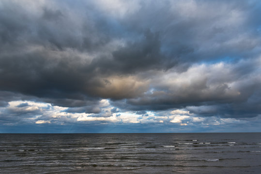 Fototapeta Dark clouds above gulf of Riga, Baltic sea.