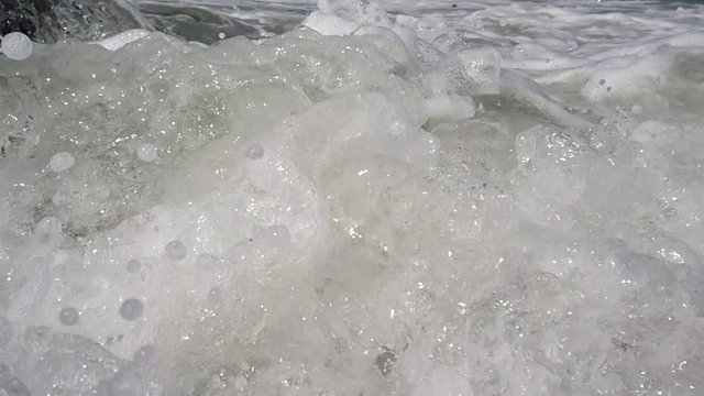 Sea waves hitting rocks