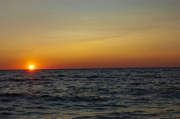 sea. sunset, the sun going into the sea