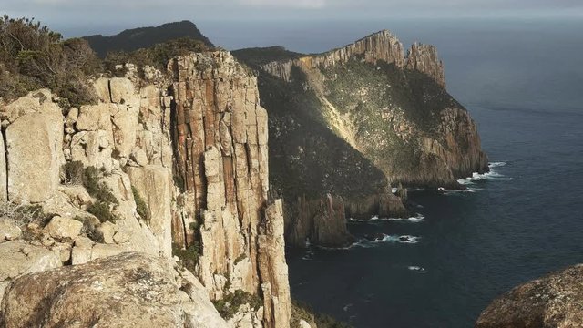 afternoon view of the sea cliffs at cape pillar on the three capes track in tasmania