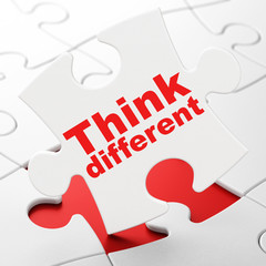 Learning concept: Think Different on White puzzle pieces background, 3D rendering