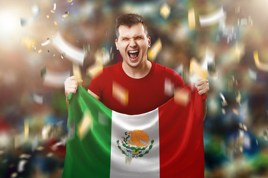 A Mexican fan, a fan of a man holding the national flag of Mexico in his hands. Soccer fan in the stadium. Mixed media