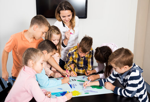 Team of elementary age children  drawing