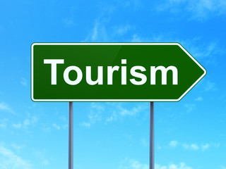 Travel concept: Tourism on green road highway sign, clear blue sky background, 3D rendering
