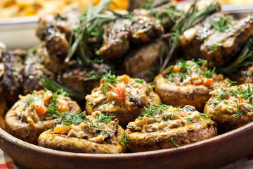 Freshly cooked sausages on a grill close-up. A background of sausages cooked on charcoal.