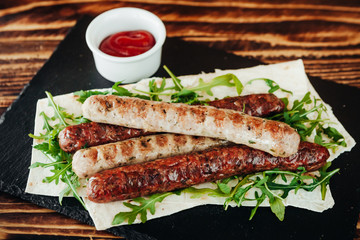 appetizing and delicious grilled meat dish with vegetables and herbs