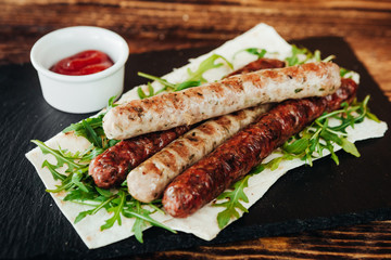 appetizing and delicious grilled meat dish with vegetables and herbs