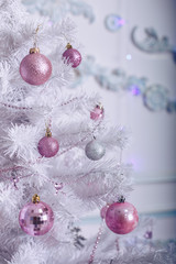 Christmas tree with pink and white toys