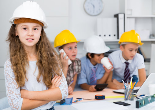 girl engineer and children  in the office
