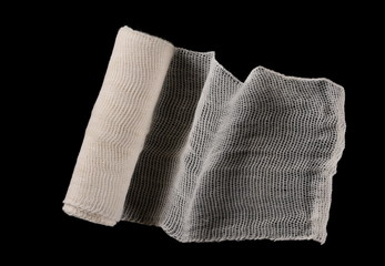 Medical bandage isolated on black background