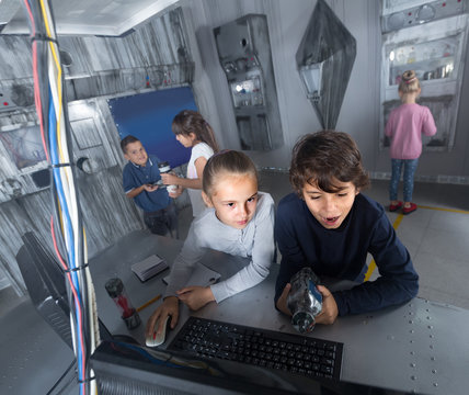 children play in the quest room of a inscrutable bunker
