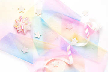 Festive background in Rainbow pastel colors. Unicorn party.