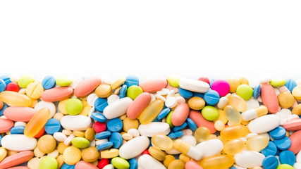 Fototapeta na wymiar border of colorful pills. pills and drugs
