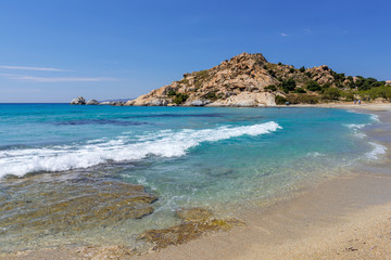 Sea with with shallow crystal clear sea water, Mikri Vigla beach on Naxos island, Greece