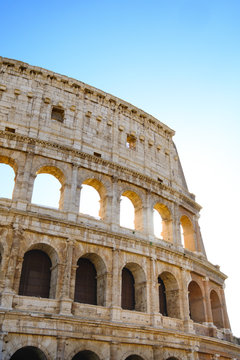 Colosseum Rome. Ruins of the  ancient Roman amphitheatre. Travel to Italy, Europe. Crowd and queue. Sunny day and blue sky