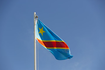 National flag of Congo on a flagpole
