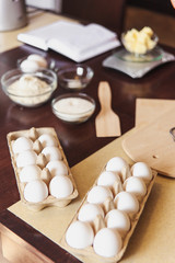 Baking ingredients on kitchen table. White products prepare for cooking. Lifestile food concept.