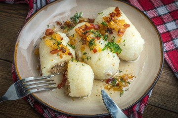 Potato dumplings stuffed with minced meat.