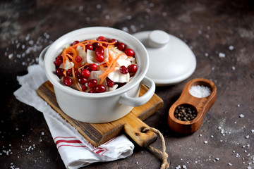 White cabbage marinated with carrots, apples and cranberries.