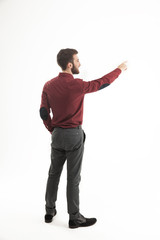 rear view - a successful Manager of a pointing hand on the blank