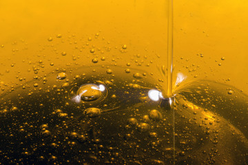 Pouring olive oil liquid