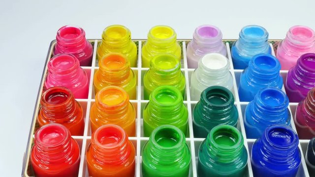 Poster paint is a distemper paint that usually uses a type of gum water or glue size as its binder. It is normally a cheap paint used in theatrical backdrops or in grade school art classes.
