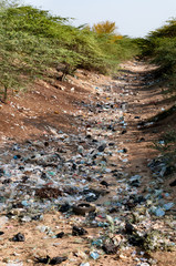 Dry river full of plastic garbage damage to the environment.